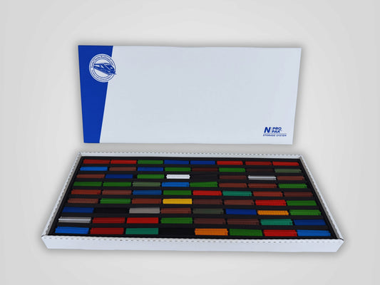 Pro Pak N Standard box filled with colourful N scale rolling stock, lid standing behind